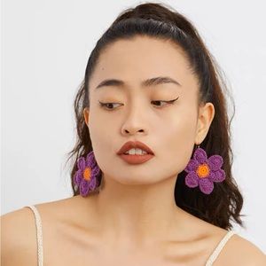 Little Banana hand made purple sun flower ear clips, new